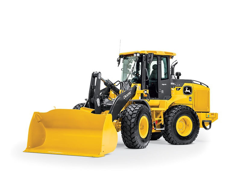 Student operating a front-end loader during hands-on training at HEO Academy